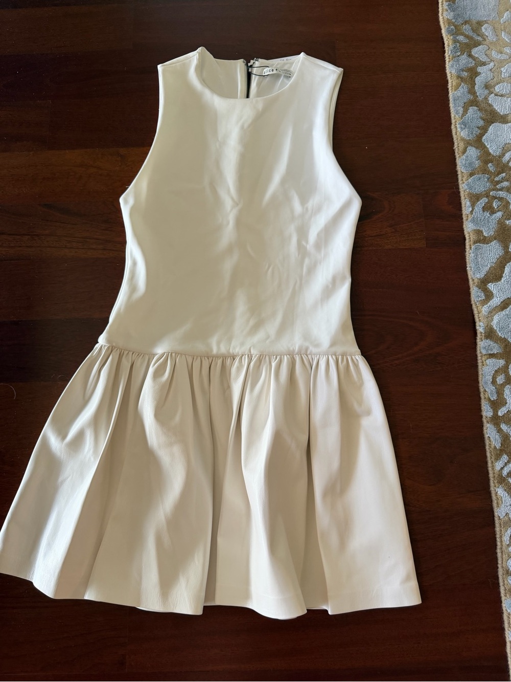 Alice + Olivia ecru dress with vegan leather skirt and polyester elastin fabric